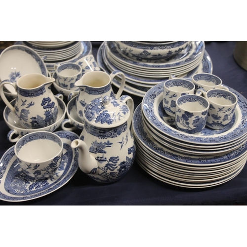 48 - Wedgwood blue and white willow pattern pottery to include teapot, tureens, jugs, etc.