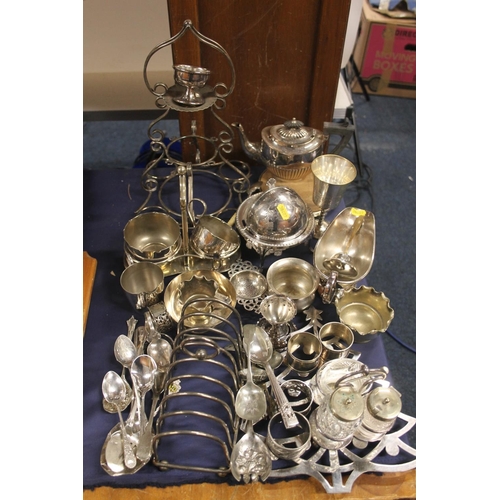 60 - Silver-plated items to include a teapot, jug, etc.