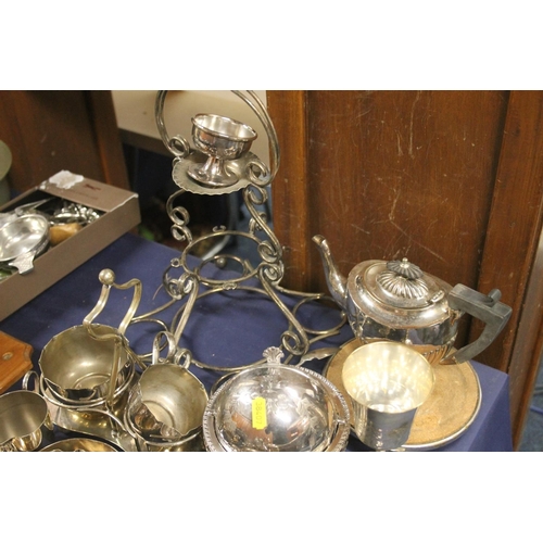 60 - Silver-plated items to include a teapot, jug, etc.