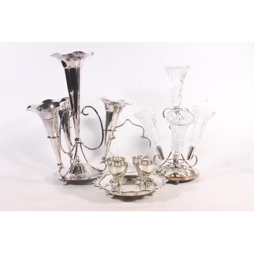 63 - Silver-plated epergne, a dinner gong, a glass and silver-plates epergne and an egg cup set.