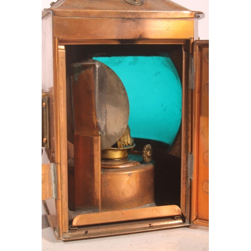 9 - Brass and copper ship's lanterns for Starboard and Port, 21cm high.