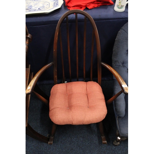 713 - Ercol spindle back open armchair.