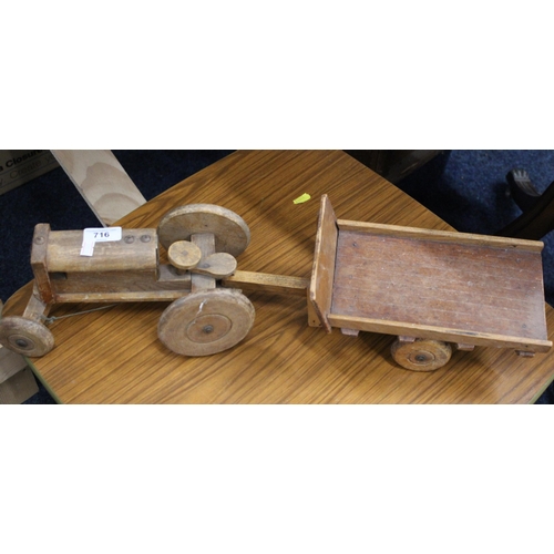 716 - Childs wooden toy tractor and cart model.