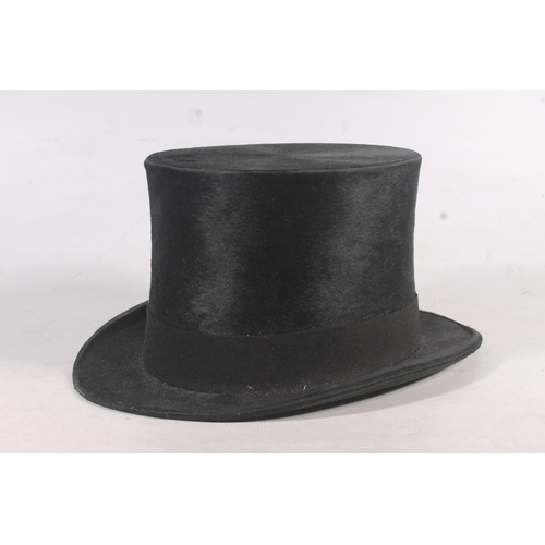 125 - Victorian Malacca cane with Indian white metal top, and a top hat (2)