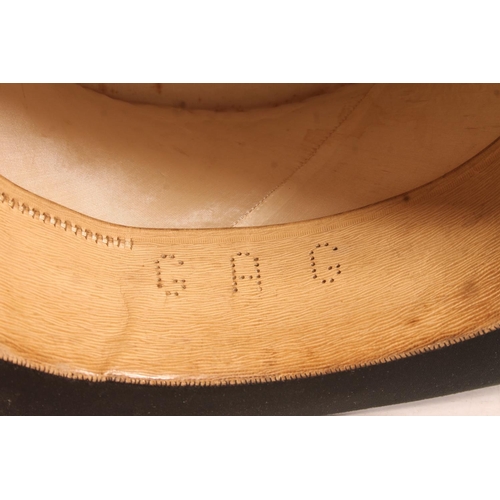 125 - Victorian Malacca cane with Indian white metal top, and a top hat (2)