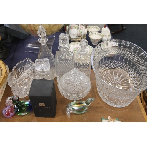 132 - Glass ware to include a bowl, decanters, a paperweight, etc.
