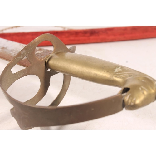141 - Middle Eastern brass hilted sabre.