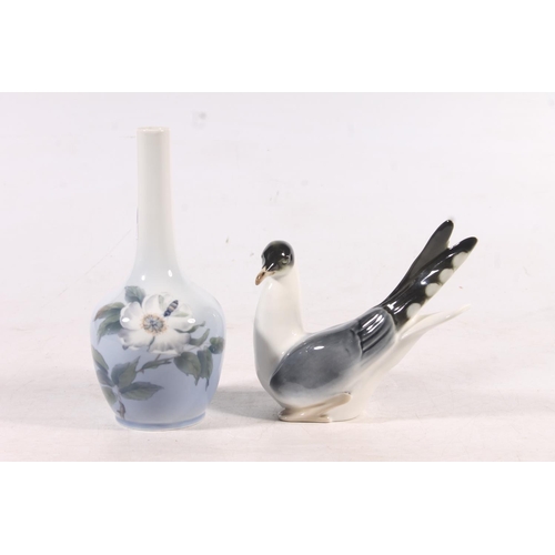 146 - Royal Copenhagen floral decorated vase and a Lomonosov bird model.