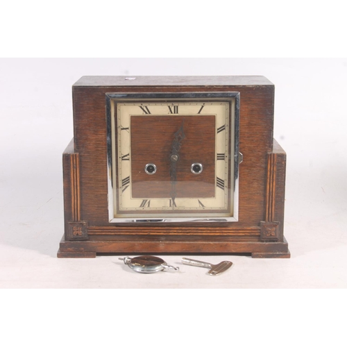 151 - Oak cased Art Deco mantle clock.