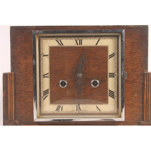 151 - Oak cased Art Deco mantle clock.