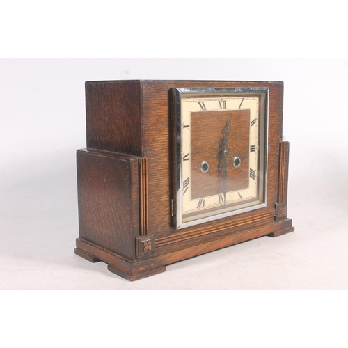151 - Oak cased Art Deco mantle clock.