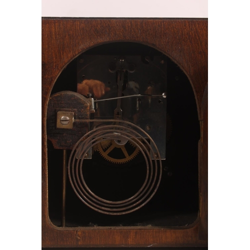 151 - Oak cased Art Deco mantle clock.