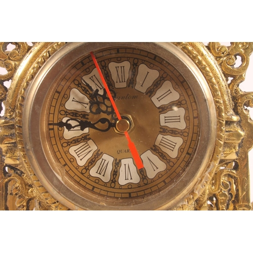152 - Fantom quartz gilt cased mantle clock.