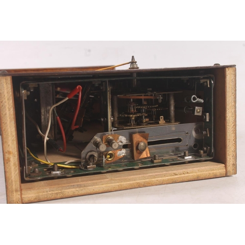 153 - Meccano wooden cased mantle clock.