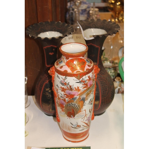 165 - A pair of black ground oriental vases with wavy edge rims (a/f) and a kutani vase.