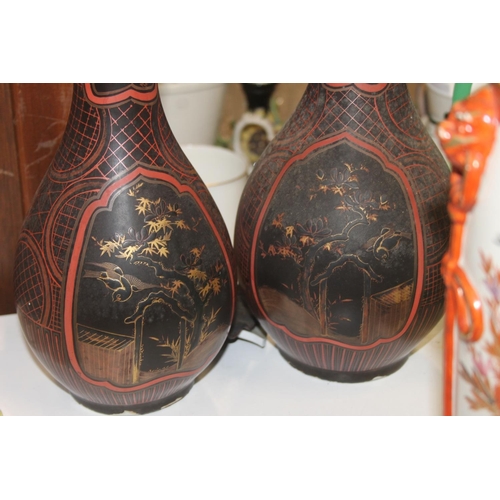 165 - A pair of black ground oriental vases with wavy edge rims (a/f) and a kutani vase.