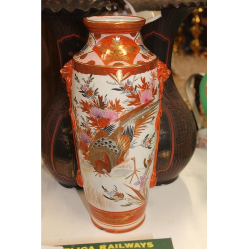 165 - A pair of black ground oriental vases with wavy edge rims (a/f) and a kutani vase.