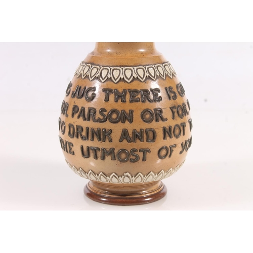178 - Doulton stoneware puzzle jug, the body with tubelined motto 'Within this jug there is good liquor 'T... 