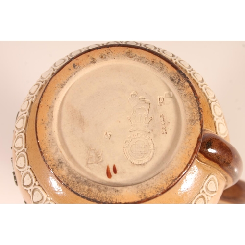 178 - Doulton stoneware puzzle jug, the body with tubelined motto 'Within this jug there is good liquor 'T... 