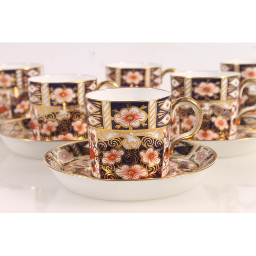 202 - Six Royal Crown Derby Imari 2451 pattern coffee cups and saucers.