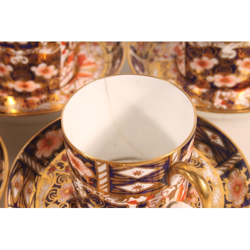 202 - Six Royal Crown Derby Imari 2451 pattern coffee cups and saucers.