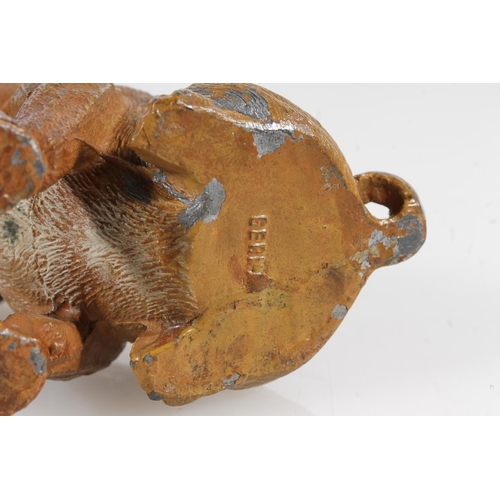 222 - German cold painted spelter figurine of a bulldog puppy with bug on nose, H8cm.