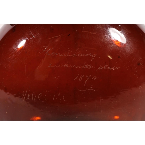 236 - German 19thC brown glass bottle with attached silver Whisky decanter label, H21cm.