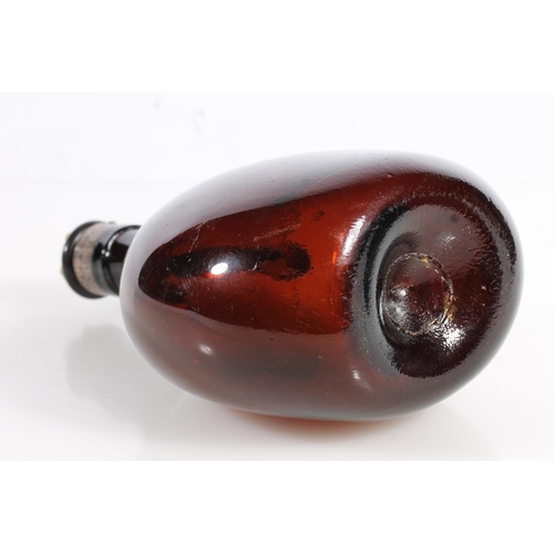 236 - German 19thC brown glass bottle with attached silver Whisky decanter label, H21cm.