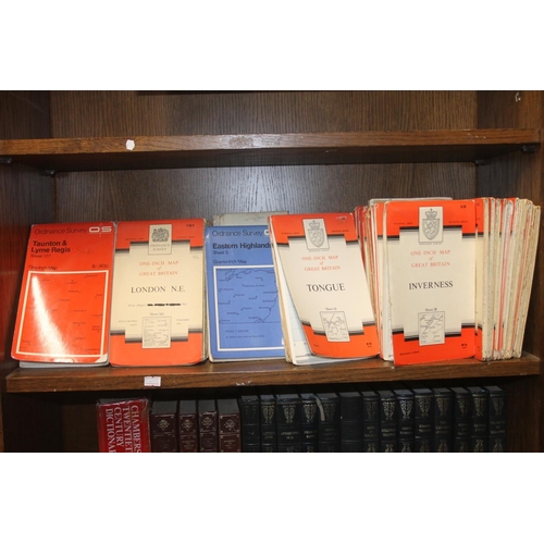 242 - Shelf containing ordnance survey maps.