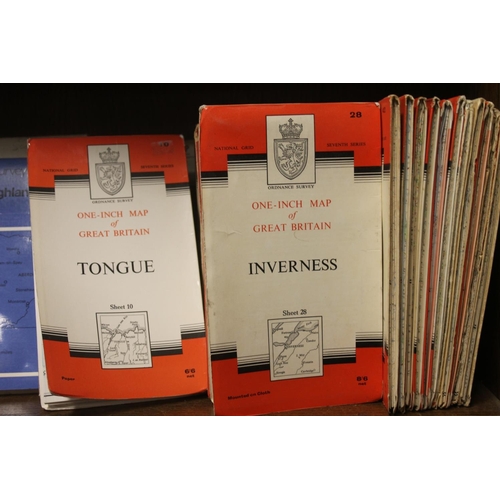 242 - Shelf containing ordnance survey maps.