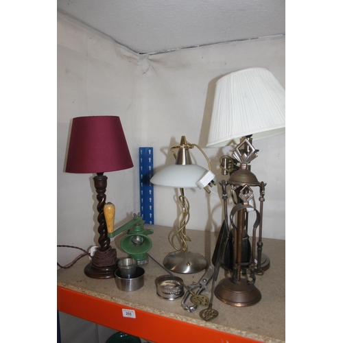 255 - Three table lamps, brass fire compendium, kitchen utensils, etc.