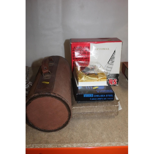 270 - Cased set of bowls, boxed binoculars, etc.