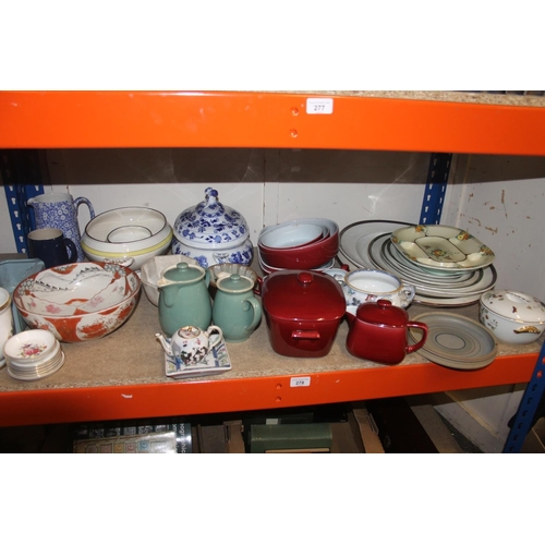 278 - Shelf containing decorative ceramics to include jelly moulds, platters, oriental bowl, etc.