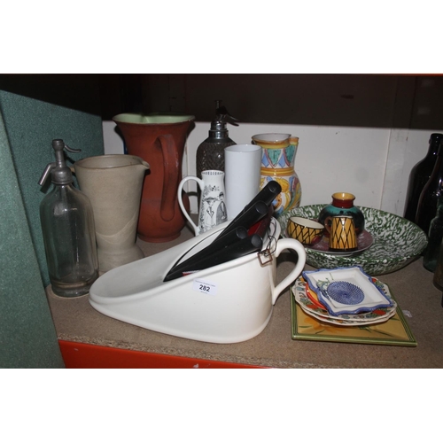 282 - Decorative ceramics to include jugs, soda syphons, etc.