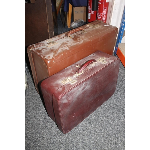 296 - Two vintage travel suitcases.