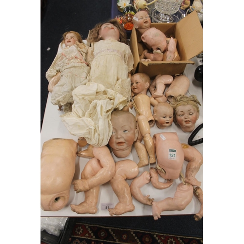 81 - Bisque headed dolls and doll parts.