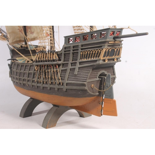 93 - Cast model of a galleon flying Saltire flags.