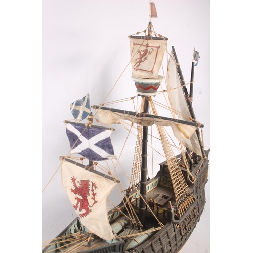 93 - Cast model of a galleon flying Saltire flags.