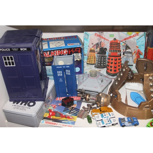 Collection of toys to include Dr Who tardis, remote control figure, etc.