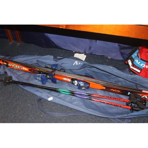 248A - Cased set of saloman skis.