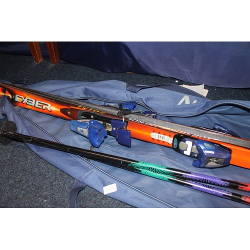 248A - Cased set of saloman skis.