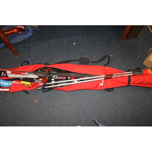 248B - Cased set of saloman skis.