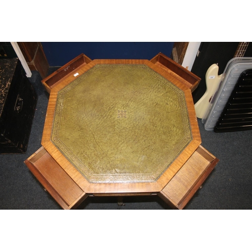 721 - Octagonal topped mahogany occasional table with leather skiver, in green.