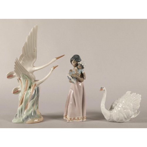 26 - Lladro girl with doll and Lladro Swan and a Nao figure Herons in flight (3)