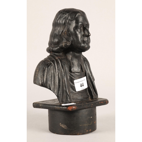 44 - 19th century cast metal door stop in the form of the Methodist founder John Wesley.