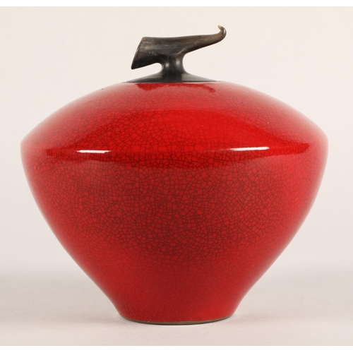 6 - Tim Andrews red raku bulbous jar and cover. approx. 17cm to tip of lid