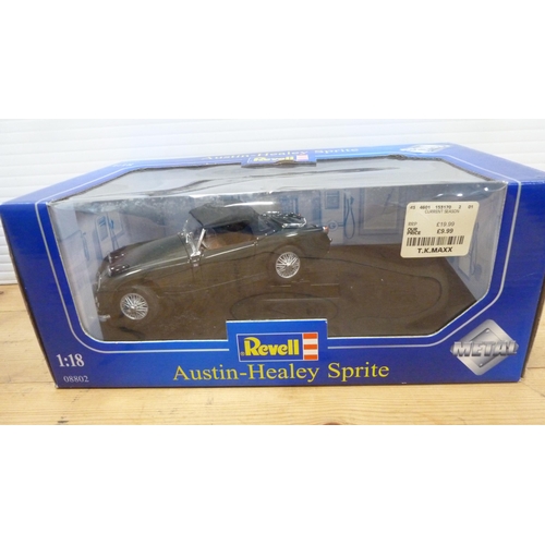 15 - Four boxed Revell diecast model to include 08447 MGA Roadster, two 08443 MGA Roadsters, and 08802 Au... 