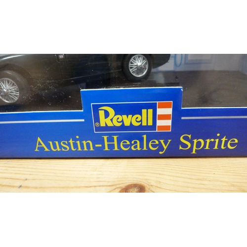 15 - Four boxed Revell diecast model to include 08447 MGA Roadster, two 08443 MGA Roadsters, and 08802 Au... 