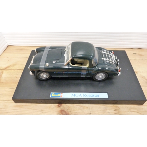 15 - Four boxed Revell diecast model to include 08447 MGA Roadster, two 08443 MGA Roadsters, and 08802 Au... 