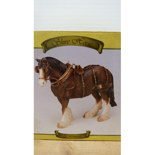 19 - Three boxed Leonardo Collection models to include two shire horses and a Border collie.  (3)